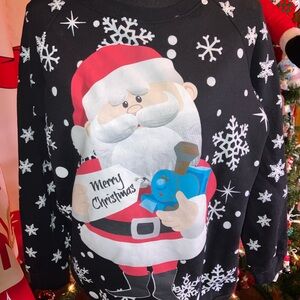Santa Claus and the misfit toys, black Christmas sweatshirt large